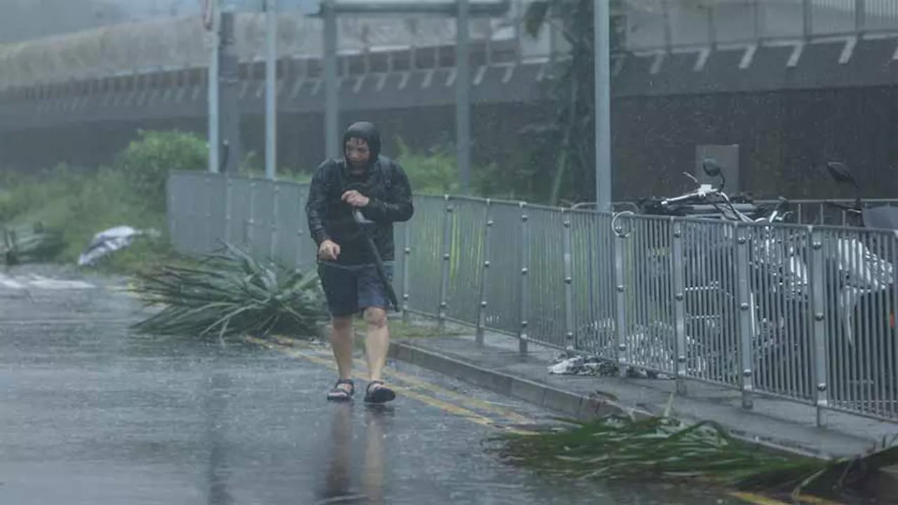 Typhoon rains batter Hong Kong before Wipha weakens to severe tropical storm in Guangdong