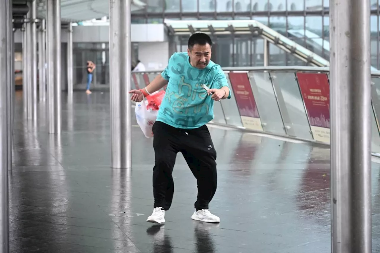 Hong Kong hit by strong winds, heavy rain as Typhoon Wipha skirts past