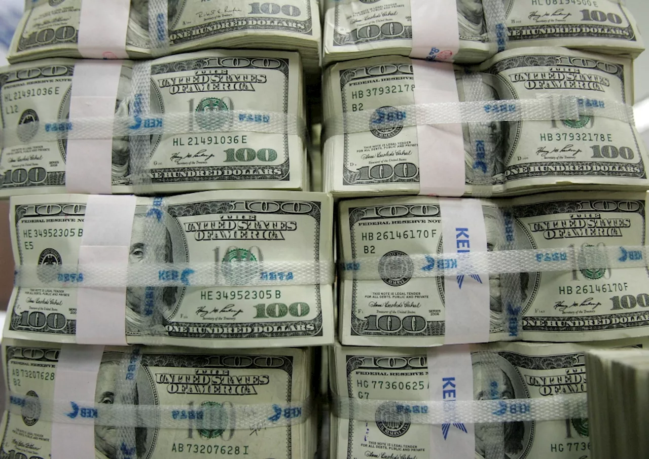 US dollar rises, but on track for weekly drop ahead of Fed, BOJ