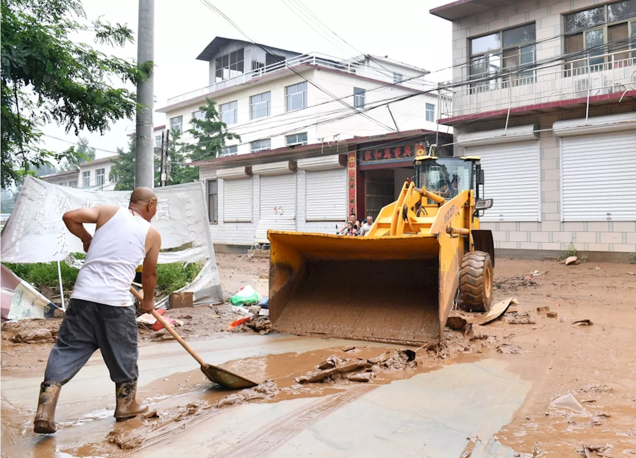 China floods: Over 4,400 evacuated as heavy rains pound Beijing, northern provinces
