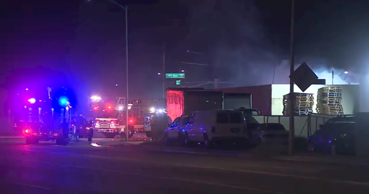 Man dead after car crashes into central Phoenix business, catching building on fire