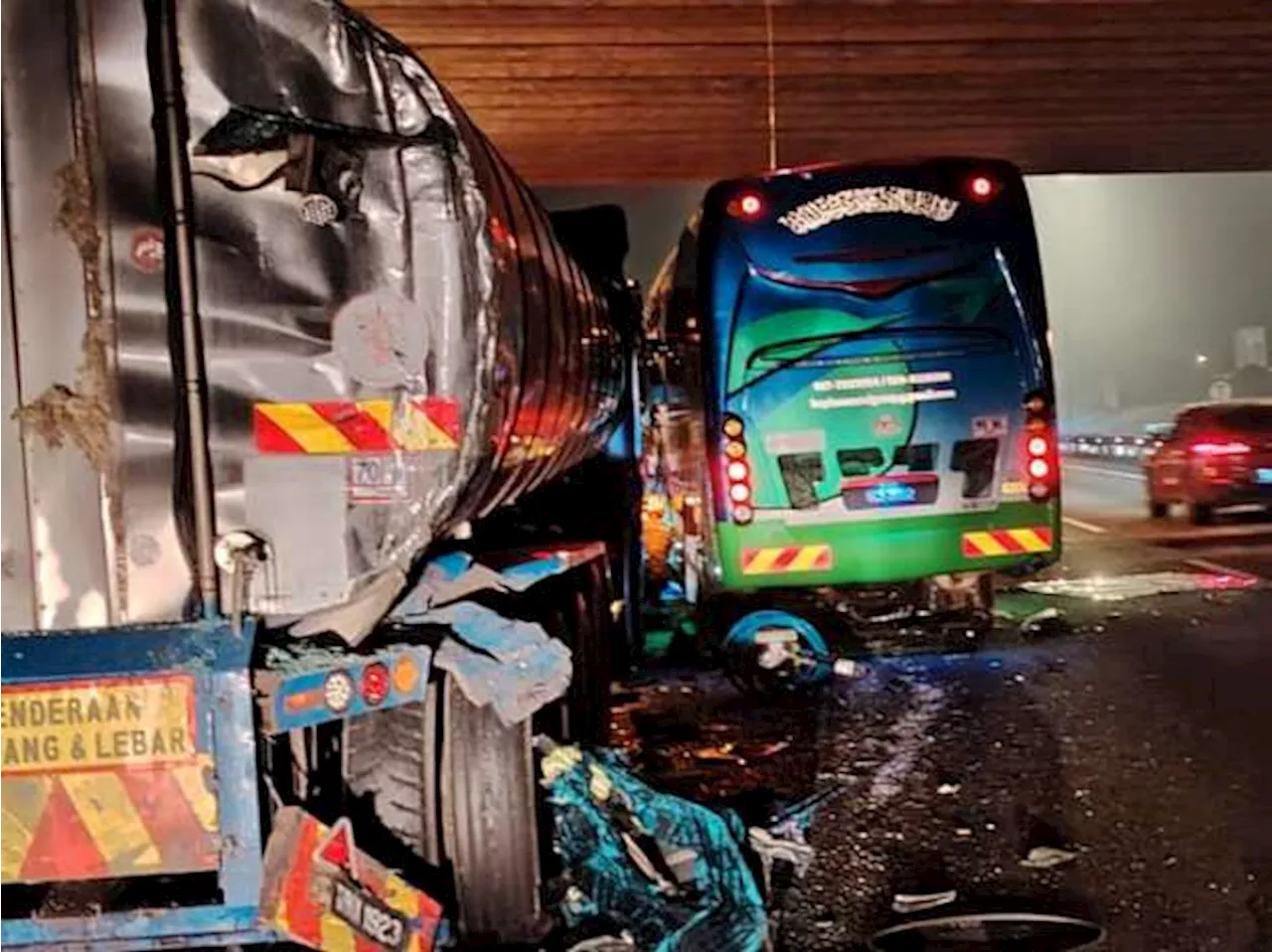 Tour bus carrying 46 passengers crashes into tanker and tow truck in Batu Pahat, leaving 2 dead, 16 injured