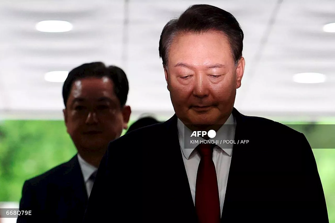 South Korean prosecutors seek warrant to question ex-president Yoon