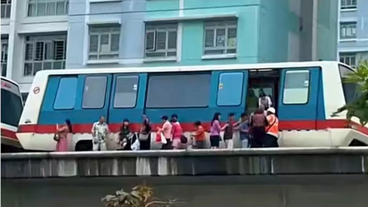 Passengers forced to walk along train tracks after latest Bukit Panjang LRT breakdown