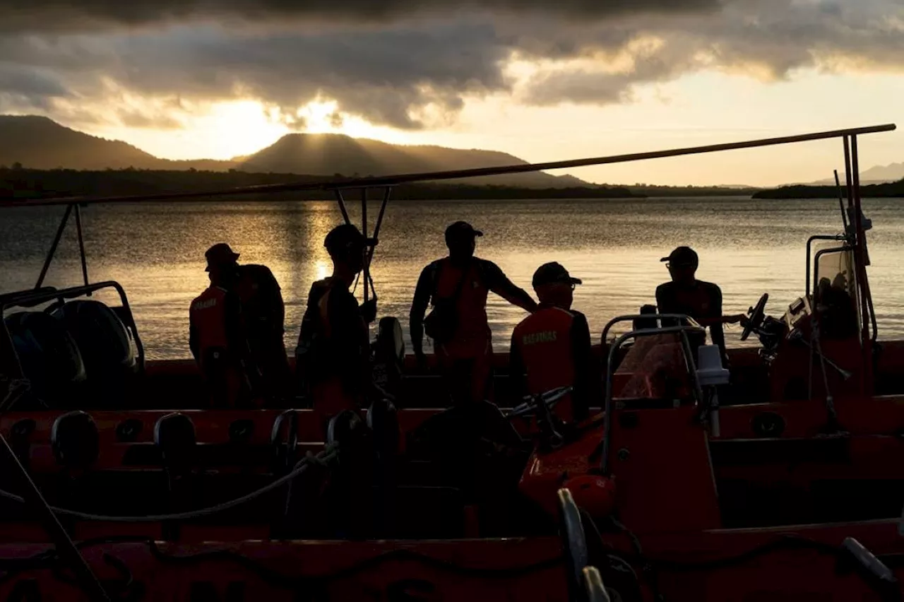 Search widens for missing after Bali-bound ferry sank