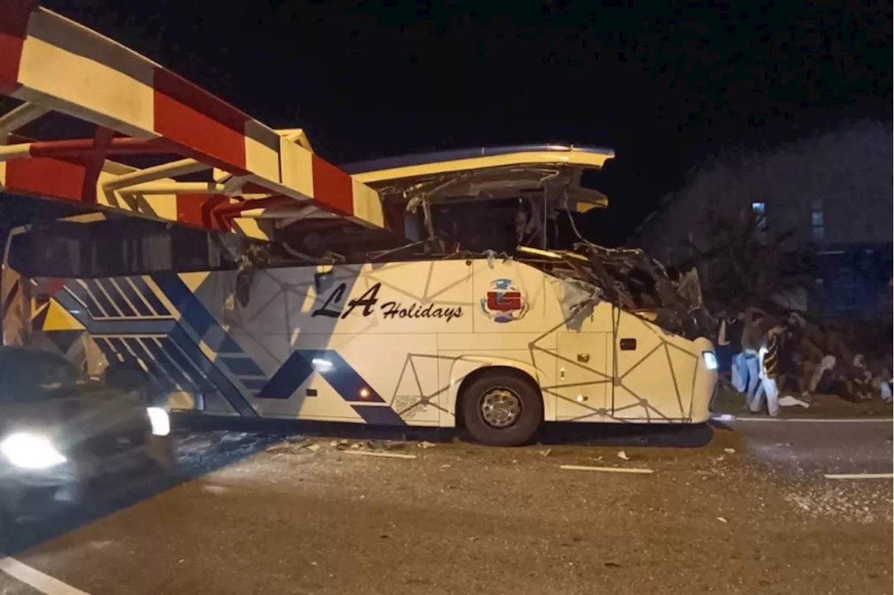 Kajang police: Express bus driver distracted while using Waze, unaware of Nilai height barrier before crashing into it