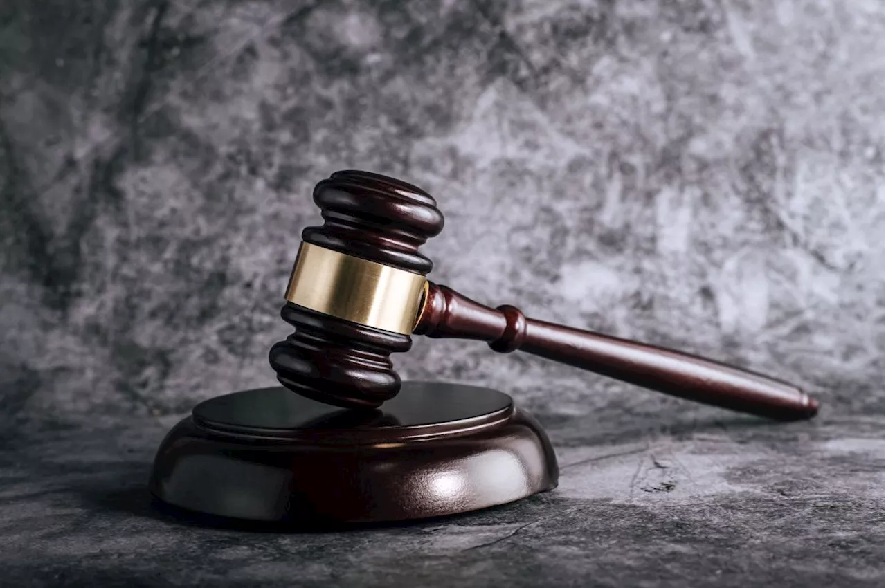 Cops claim trial to allegedly extorting foreigners for RM10,000