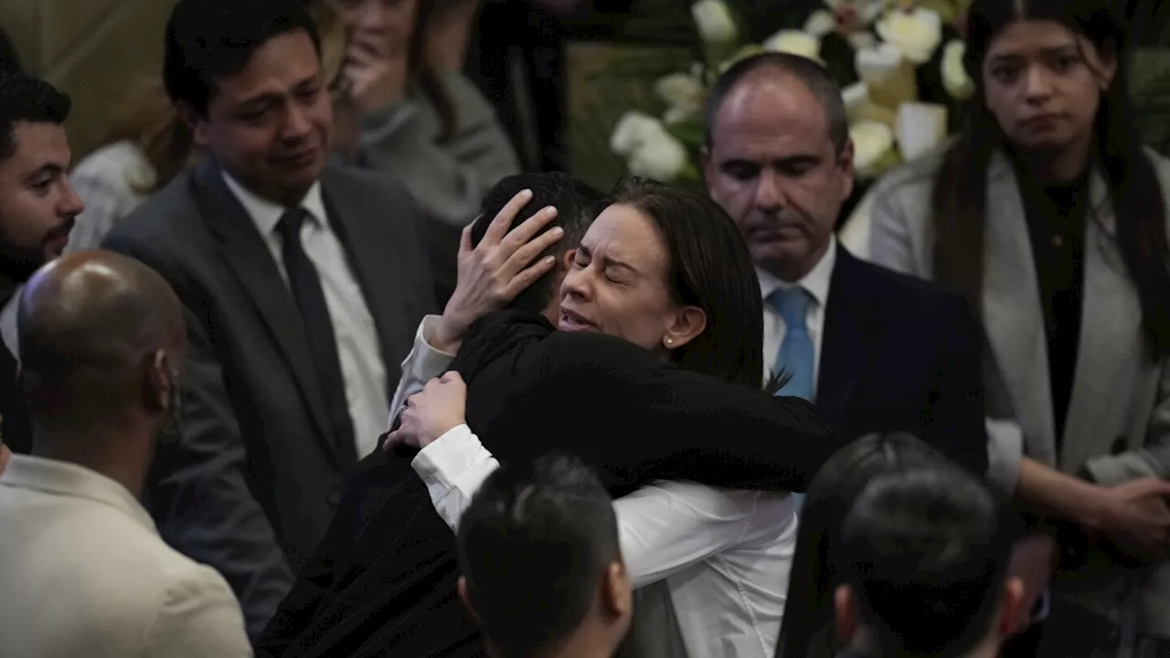 Photos of mourning for Colombian Sen. Miguel Uribe, who died 2 months after shooting at a rally