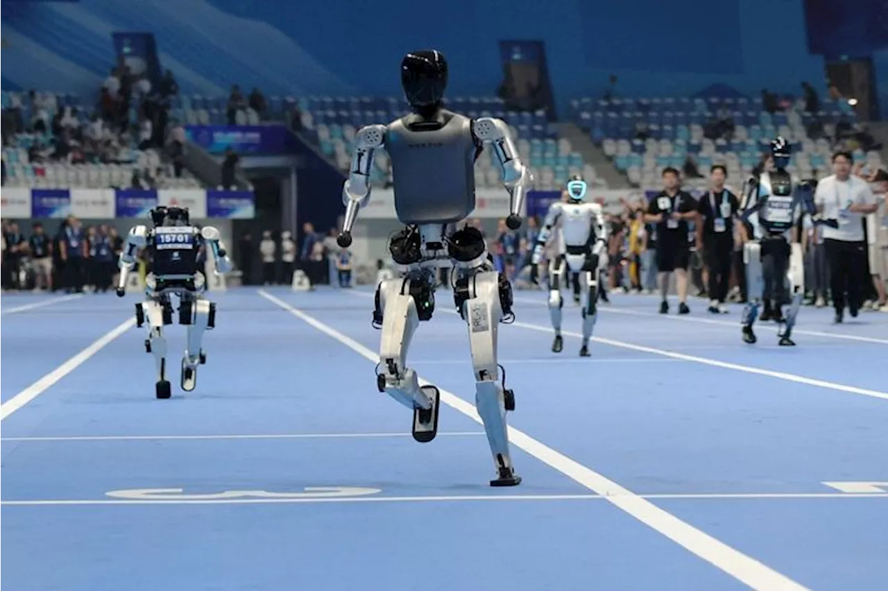 Robots race, play football, crash and collapse at China's 'robot Olympics'