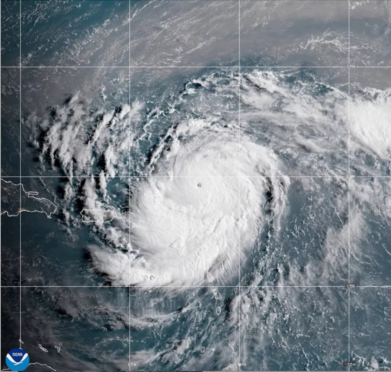 Erin downgraded to Category 3 hurricane, NHC says