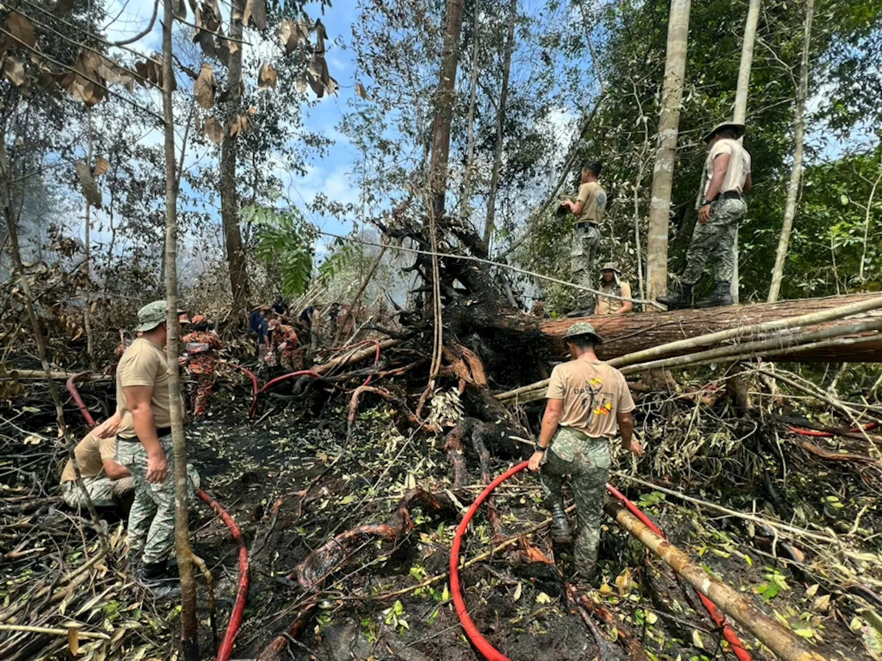 Mukah forest fire near UiTM scorches over 100ha, helicopter water bombs hotspots after two weeks