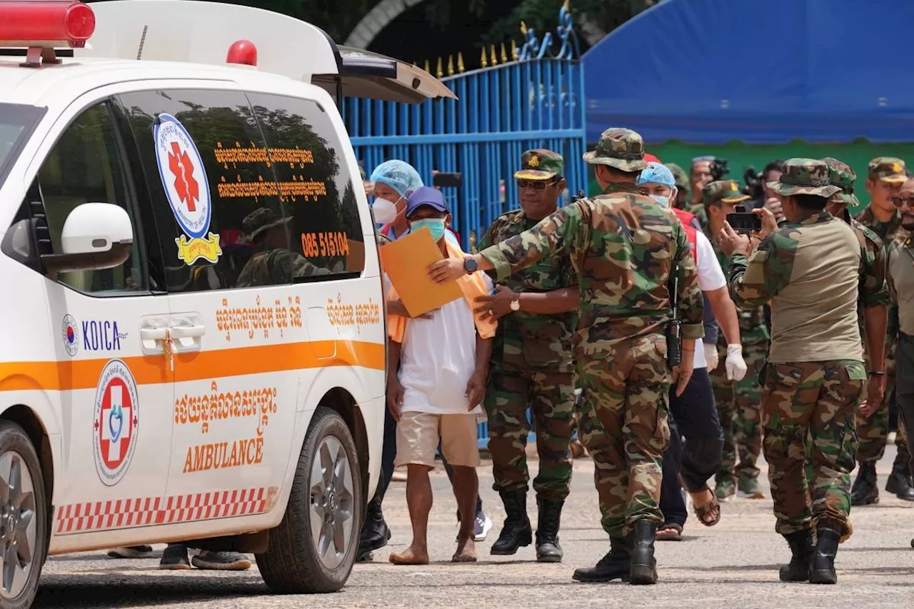 Thailand returns 2 wounded soldiers to Cambodia but continues to hold 18 of their comrades