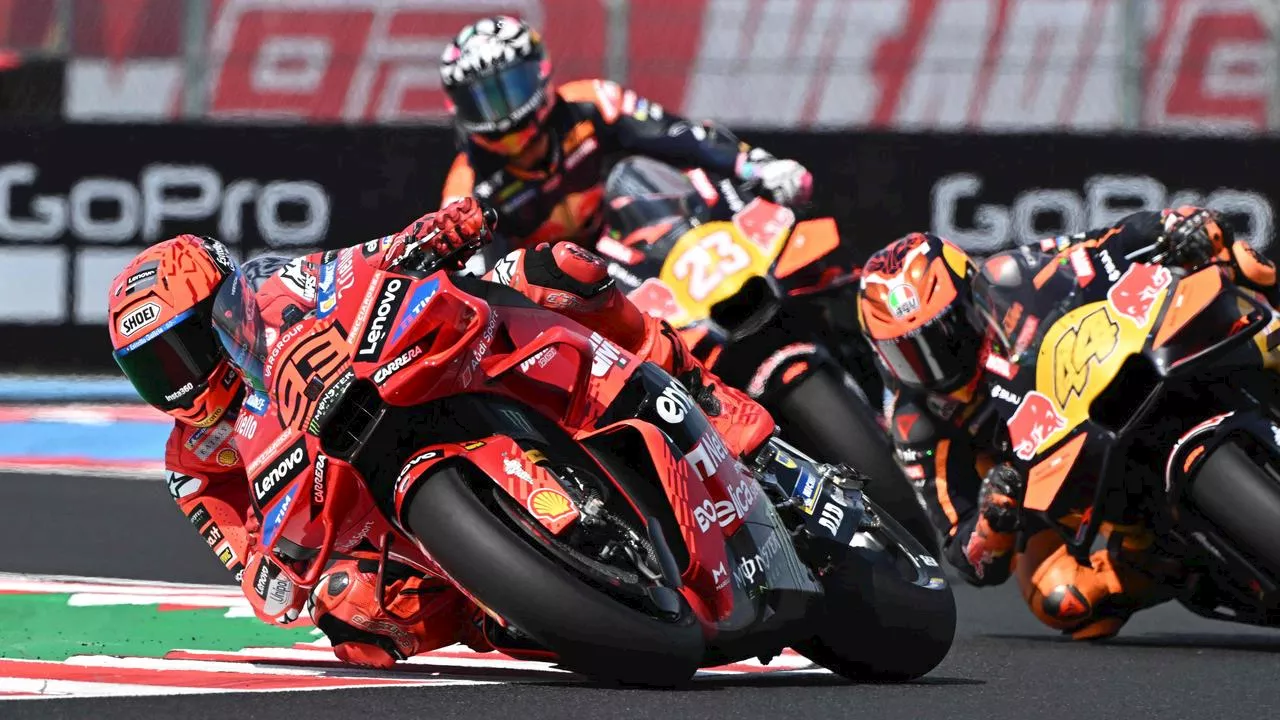 Spaniard leaves chaos behind to extend MotoGP run in Hungary sprint