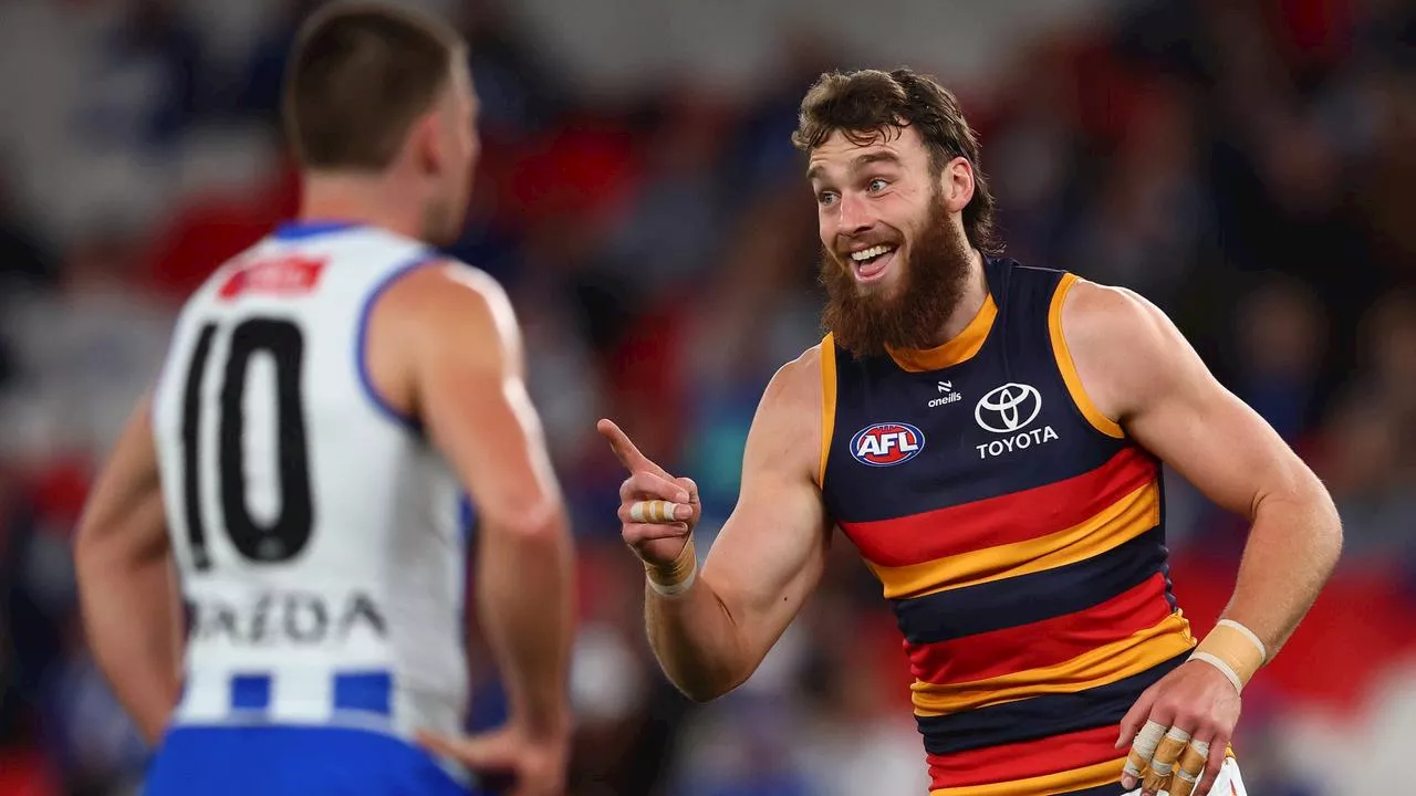 TOP SPOT LOCKED! Crows outlast gutsy Roos to cap off insane AFL rise