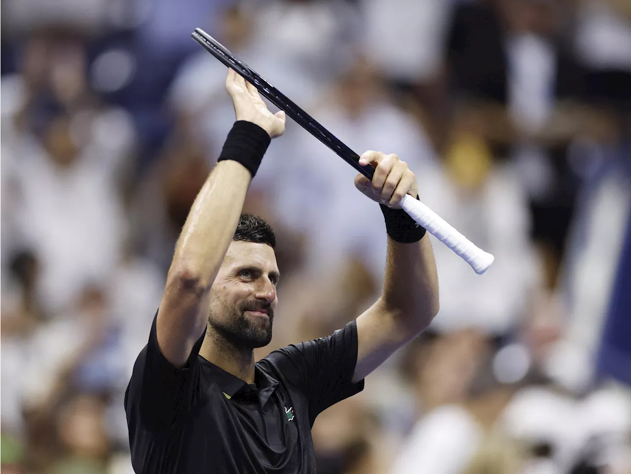 Djokovic battles past Tien to reach US Open second round