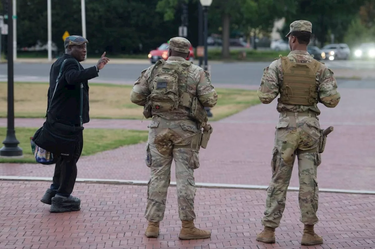 Some National Guard units in Washington are now carrying firearms in escalation of Trump deployment