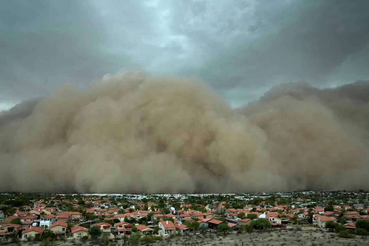 Towering wall of dust rolls through metro Phoenix, leaving tens of thousands without power