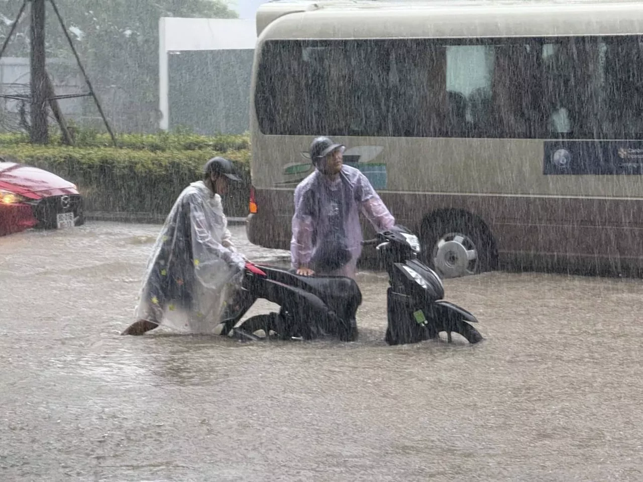 Heavy rain falls in parts of Southeast Asia after tropical storm blows into Vietnam