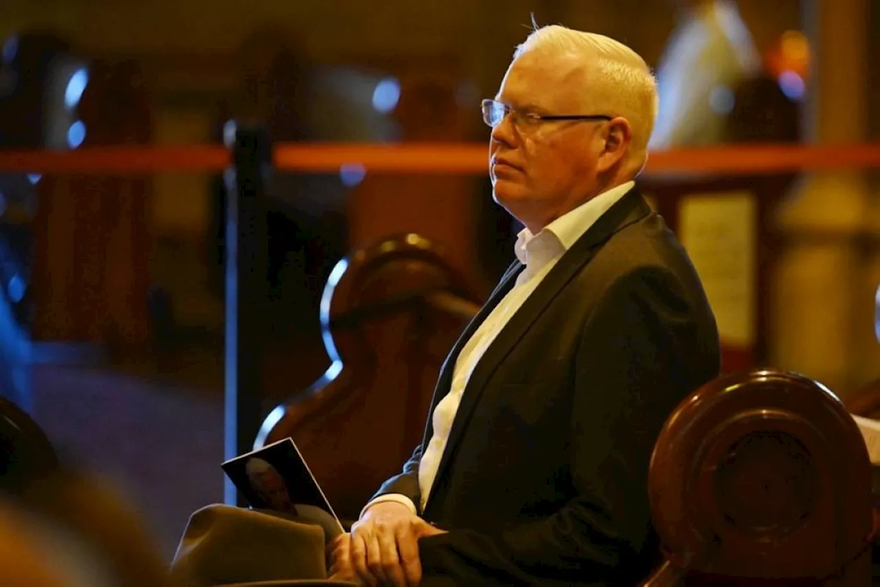 Australian politician jailed for rape refuses to leave parliament, sparking court battle to oust him