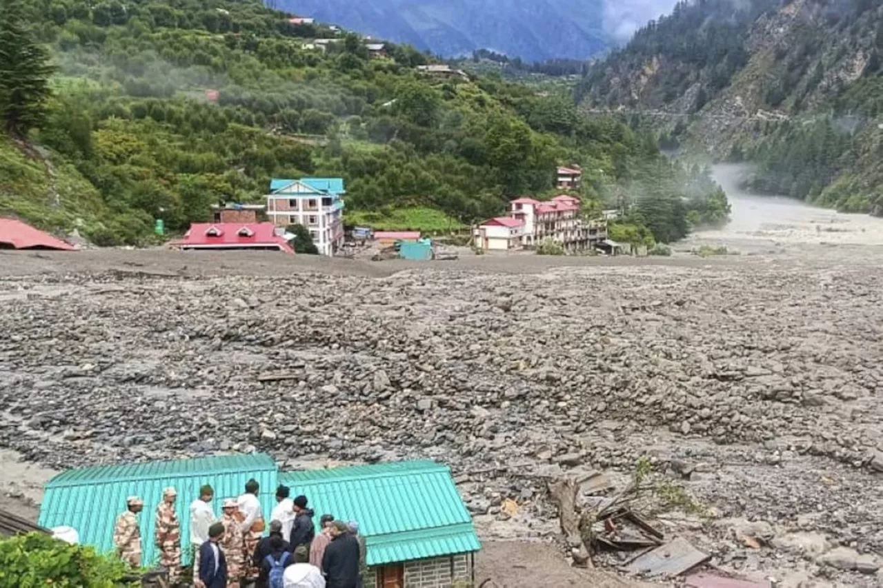 Rescuers search for dozens missing after floods kill 4 in northern India