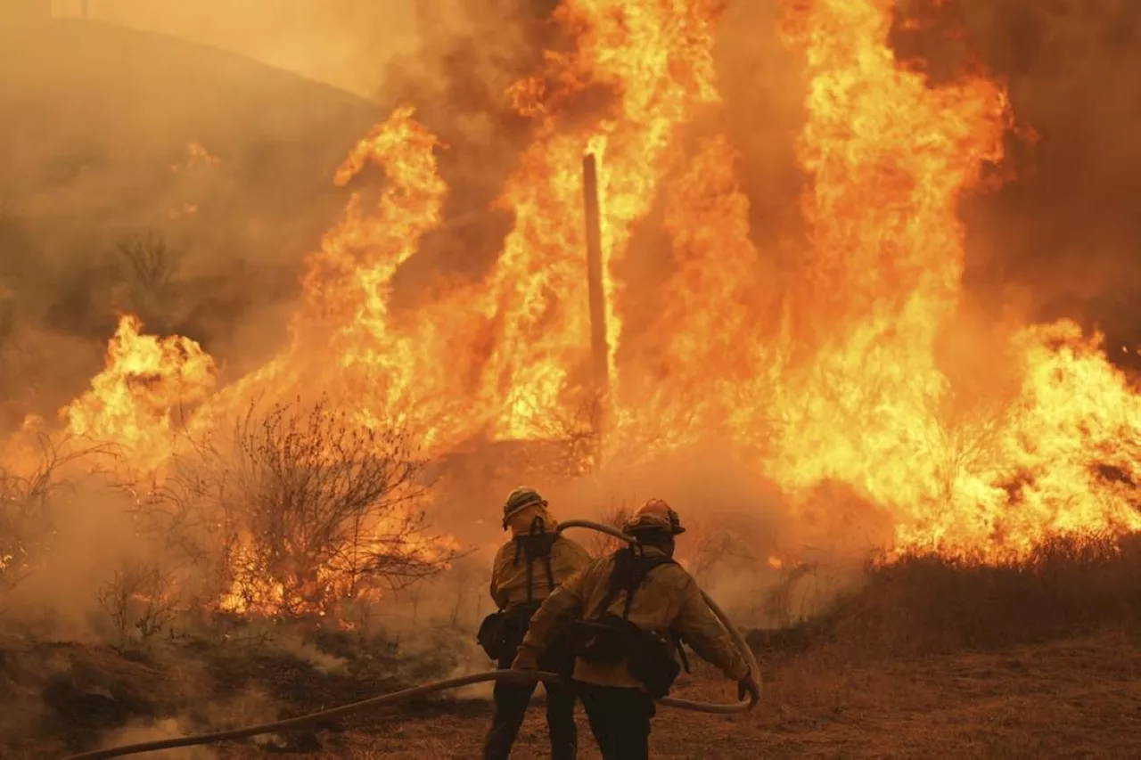 Thousands evacuated after wildfire spreads north of Los Angeles