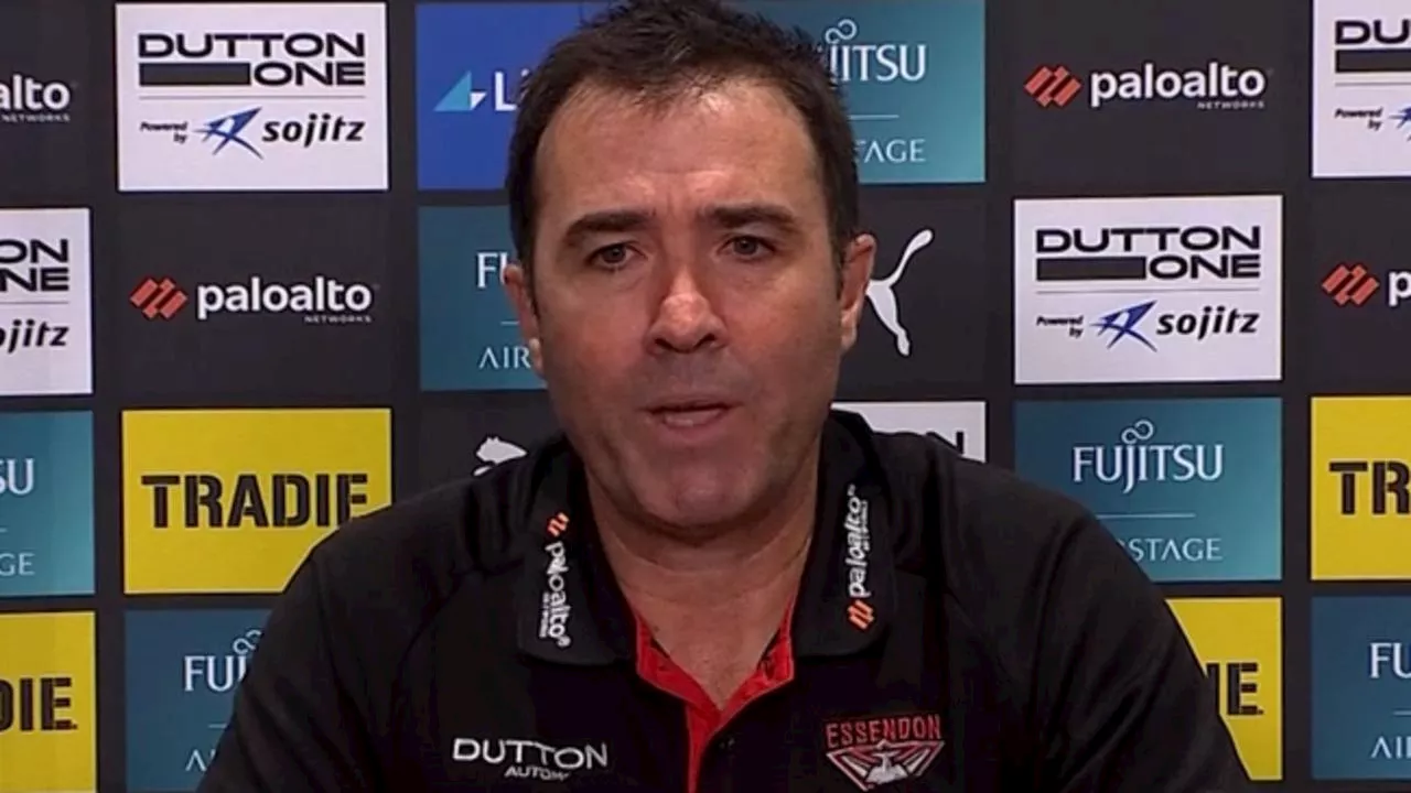 ‘Reluctant to say’: Bombers coach’s timid praise as brutal ‘reality’ keeps biting