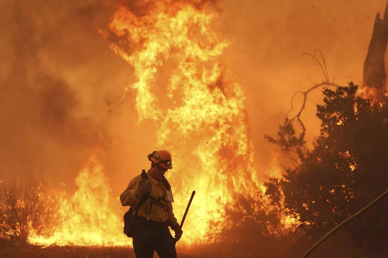 Firefighters make progress against blaze that forced thousands to flee north of Los Angeles