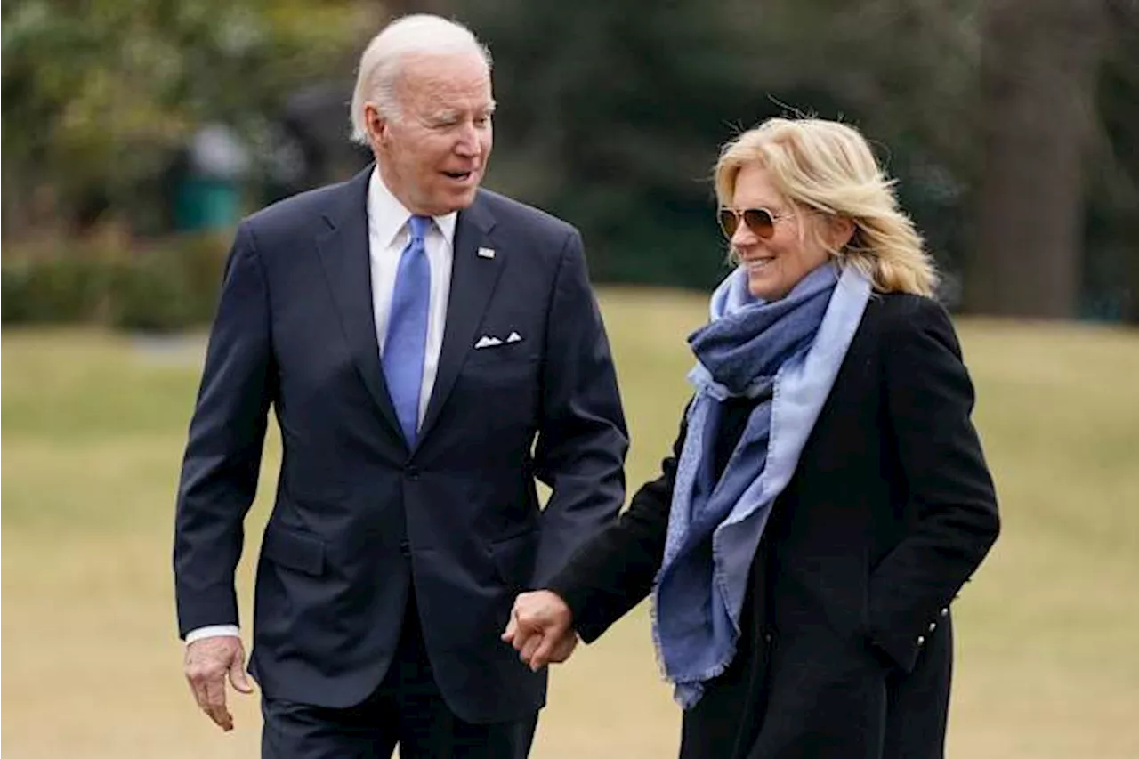 Joe and Jill Biden adopt a pair of black Lab-mix puppies named Boo and Scout